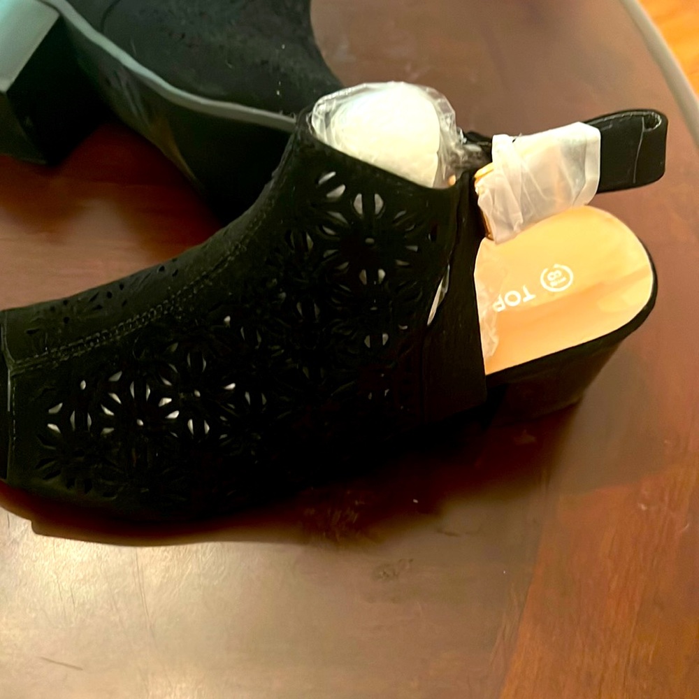 Top mod’s heels black never worn